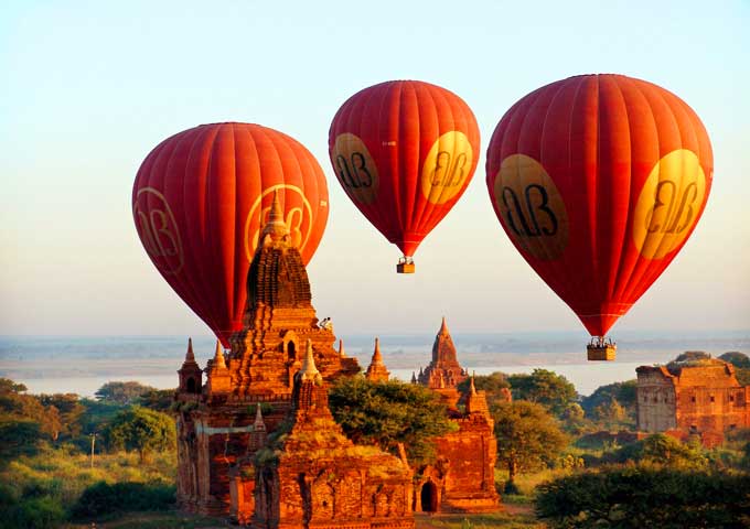 Hot air balloon over temple